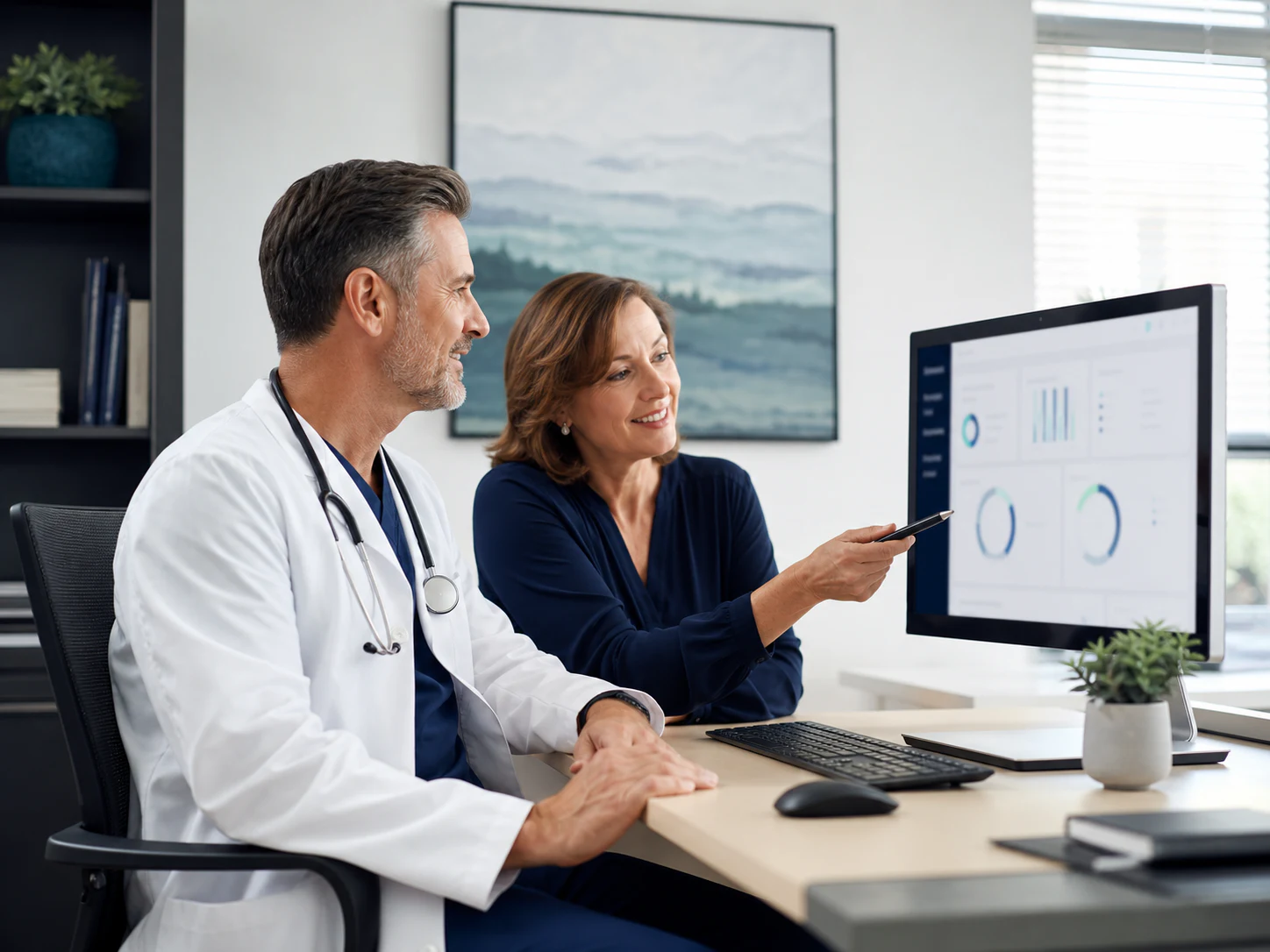 Independent physician and office manager reviewing revenue cycle performance